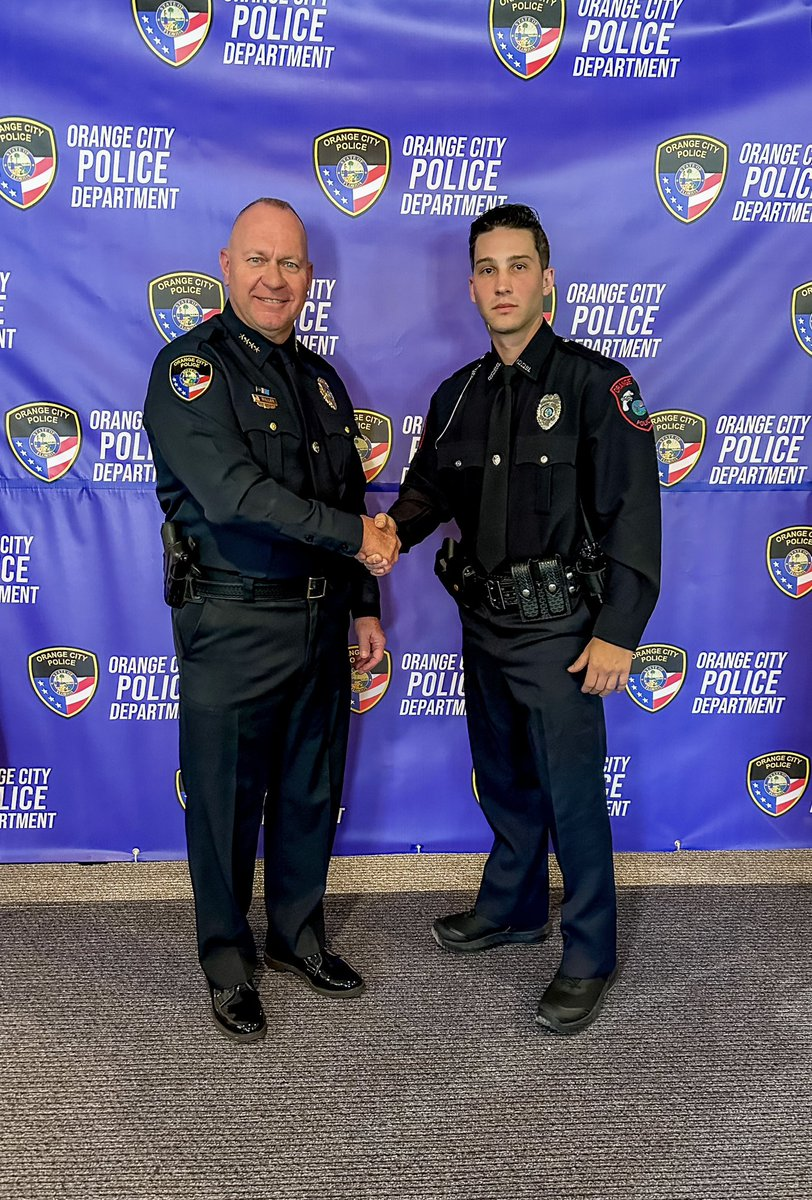 Officer Walker with an Orange City Police official