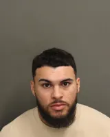Official booking photo for CORDEROSEGARRA, DERIKLEE