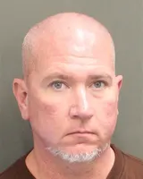 Official booking photo for DYSON, MICHAEL