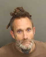 Official booking photo for JACOBS, MICHAEL THEODORE