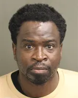 Official booking photo for LUSTIN, LUSMAR