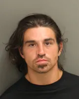 Official booking photo for MCEWEN, ATAGAHI LUKUSNATHANI